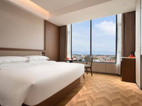 Where to Stay in Haikou: Moran莫兰酒店(海口五源河体育馆国际会展中心店) Hotel Guide (2026)
