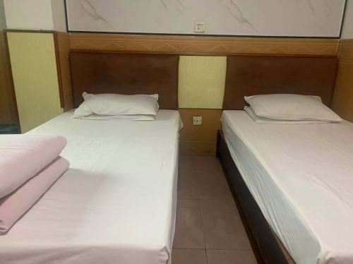 海口丽峰旅店(琼山中学店)